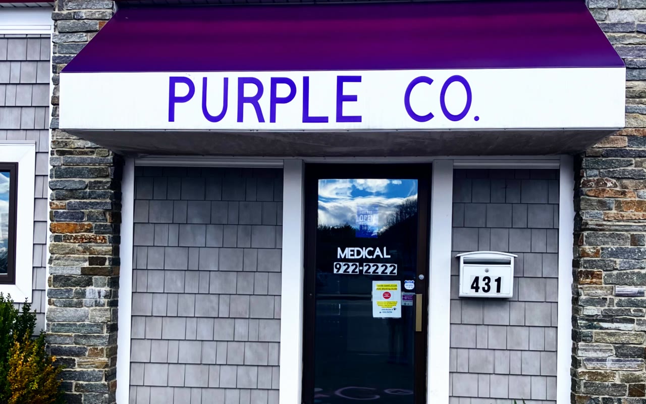 Purple Co. — Bangor: the purple-awning storefront at 431 Odlin Road